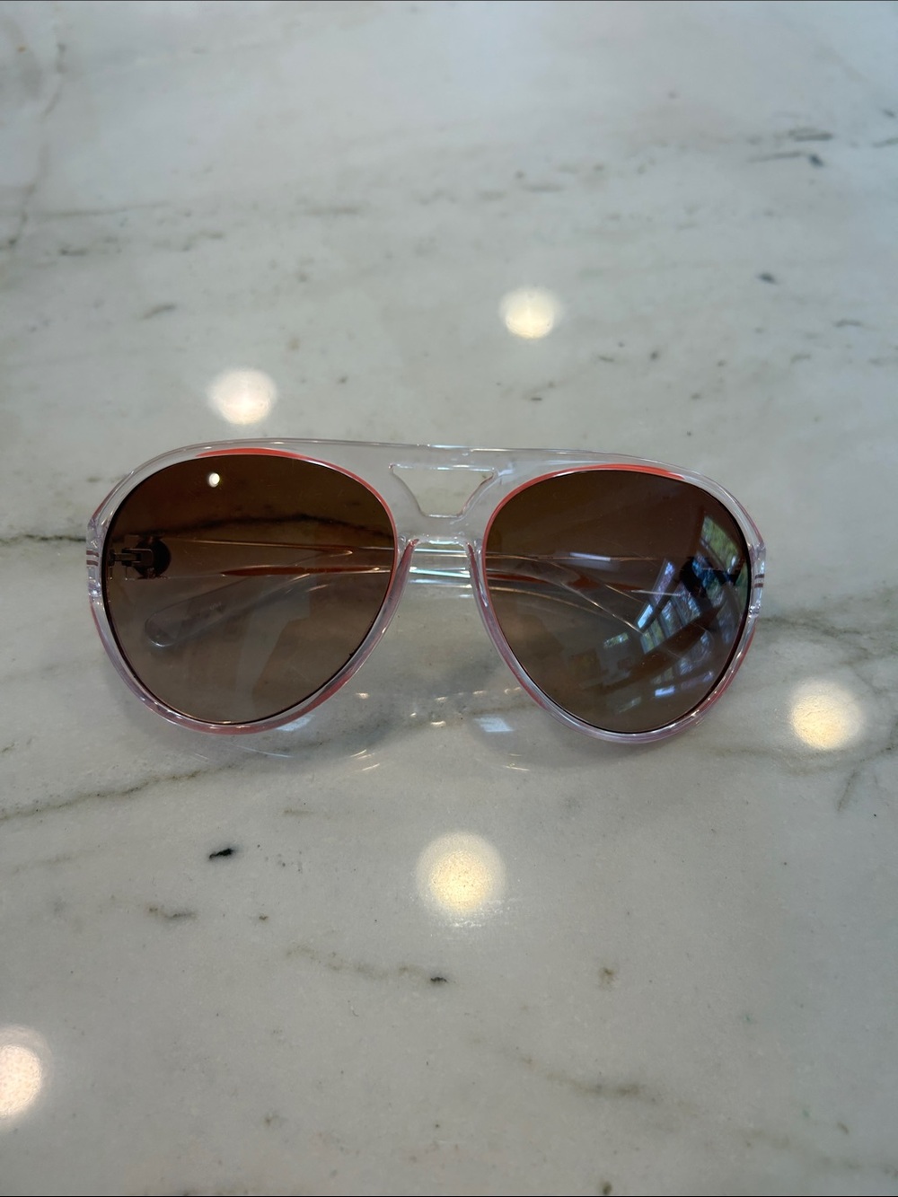 Tory Burch Clear coral Aviator Sunglasses— Brown Lenses